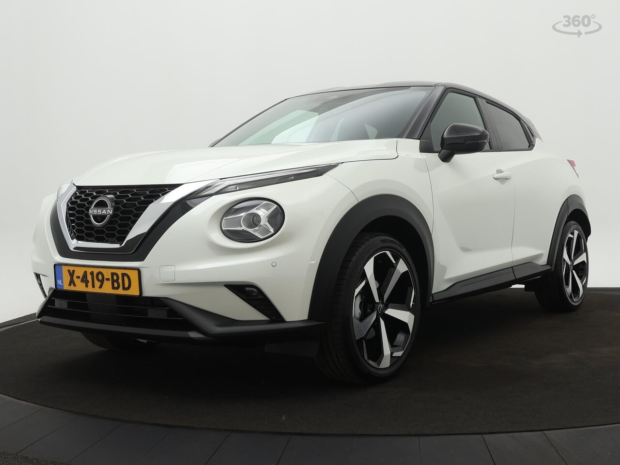 Nissan Juke - 1.0 DIG-T Tekna | DEMO | Leren bekleding | 19" Lichtmetalenvelgen | Rondomzicht camera | A - AutoWereld.nl