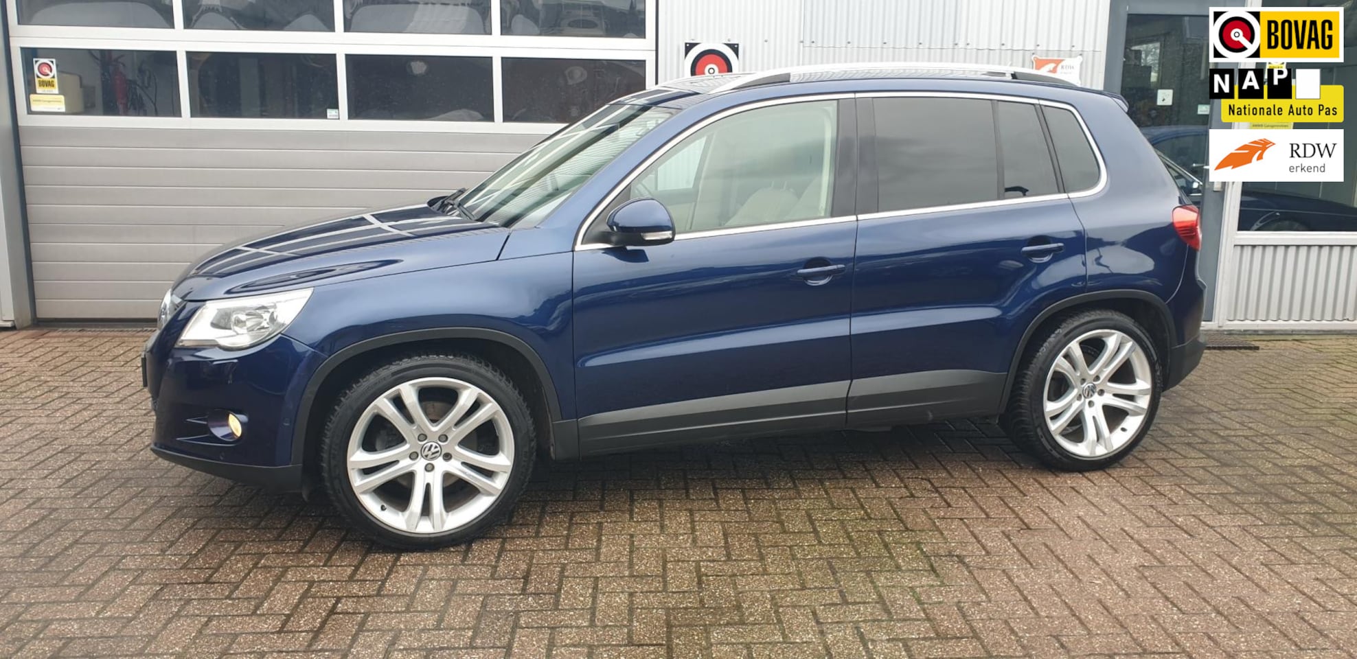 Volkswagen Tiguan - 2.0 TSI Sport&Style 4Motion Leer xenon Pano - AutoWereld.nl