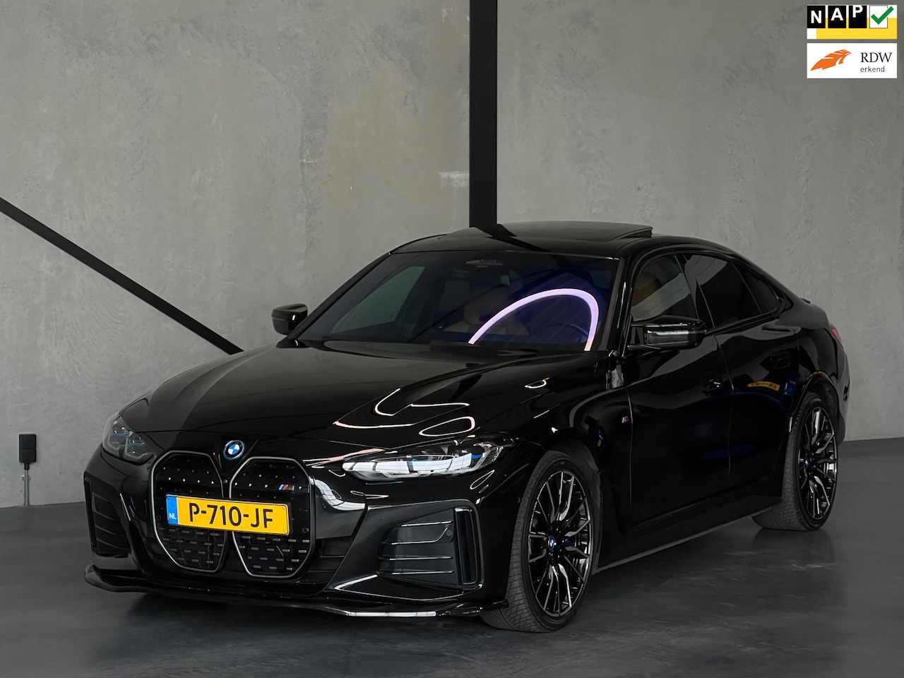 BMW i4 - M50 High Exe, Opendak, Carbon, Laser, ACC, 360°, H&K - AutoWereld.nl