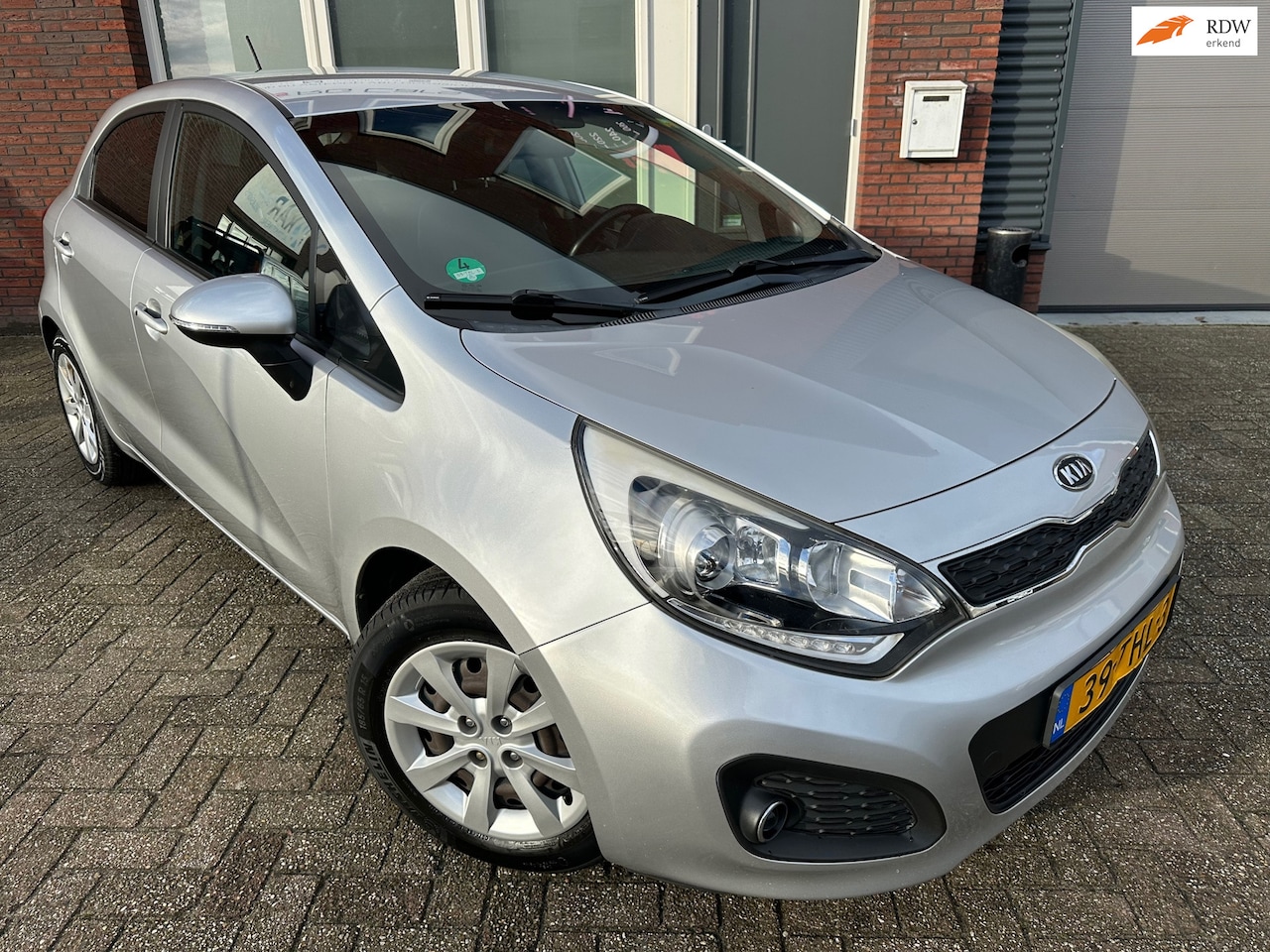 Kia Rio - 1.2 CVVT Super Pack / Clima / PDC / Keyless / AUX - AutoWereld.nl