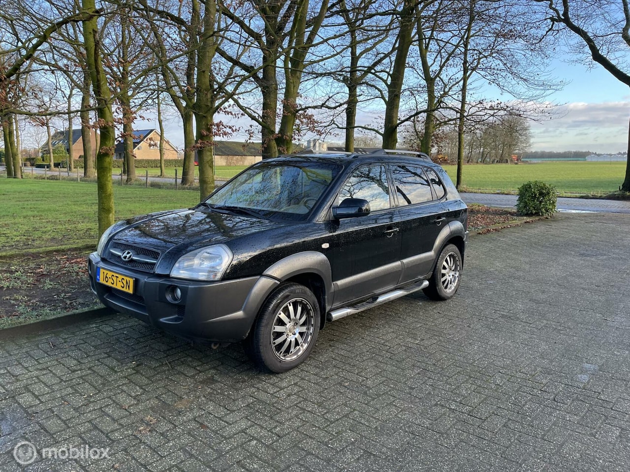 Hyundai Tucson - 2.0i Dynamic trekhaak airco apk 12-2025 - AutoWereld.nl