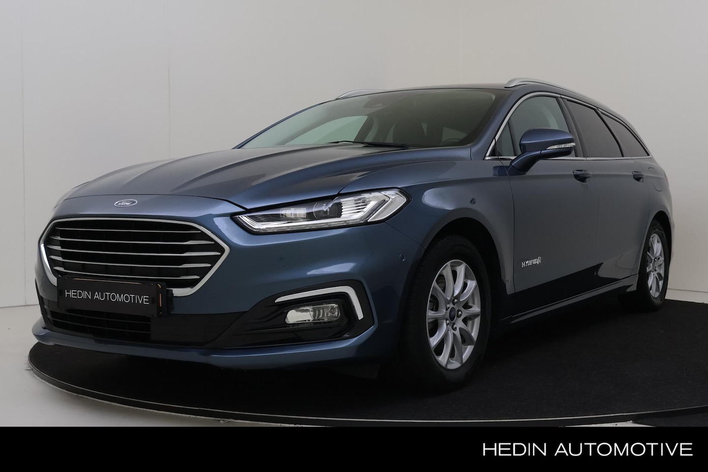 Ford Mondeo Wagon - 2.0 IVCT HEV Titanium | BLIS | SONY | Memory | Privacy glass - AutoWereld.nl