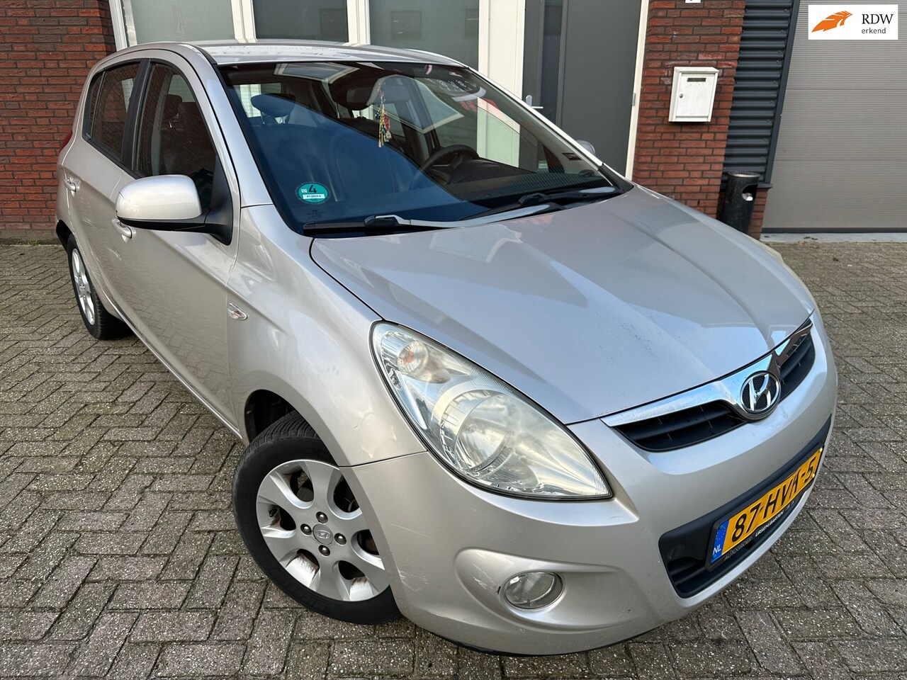 Hyundai i20 - 1.4i i-Catcher / Airco / Leder / PDC / Clima - AutoWereld.nl