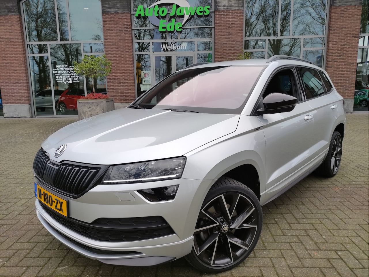 Skoda Karoq - 1.5 TSI DSG ACT Sportline Business Adaptieve Cr.control - Blindspot detectie - Canton Audi - AutoWereld.nl