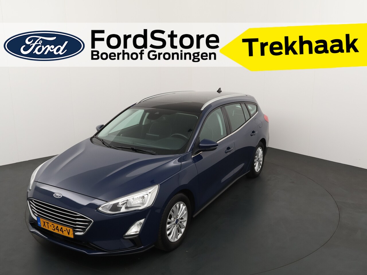 Ford Focus Wagon - EcoBoost 125pk Titanium | Adapt. Cruise | Panorama | B&O | Clima | Dealer onderhouden - AutoWereld.nl