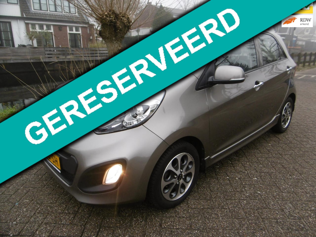 Kia Picanto - 1.2 CVVT 4-Cilinder 86pk 71.000km Plus Pack Clima Keyless - AutoWereld.nl