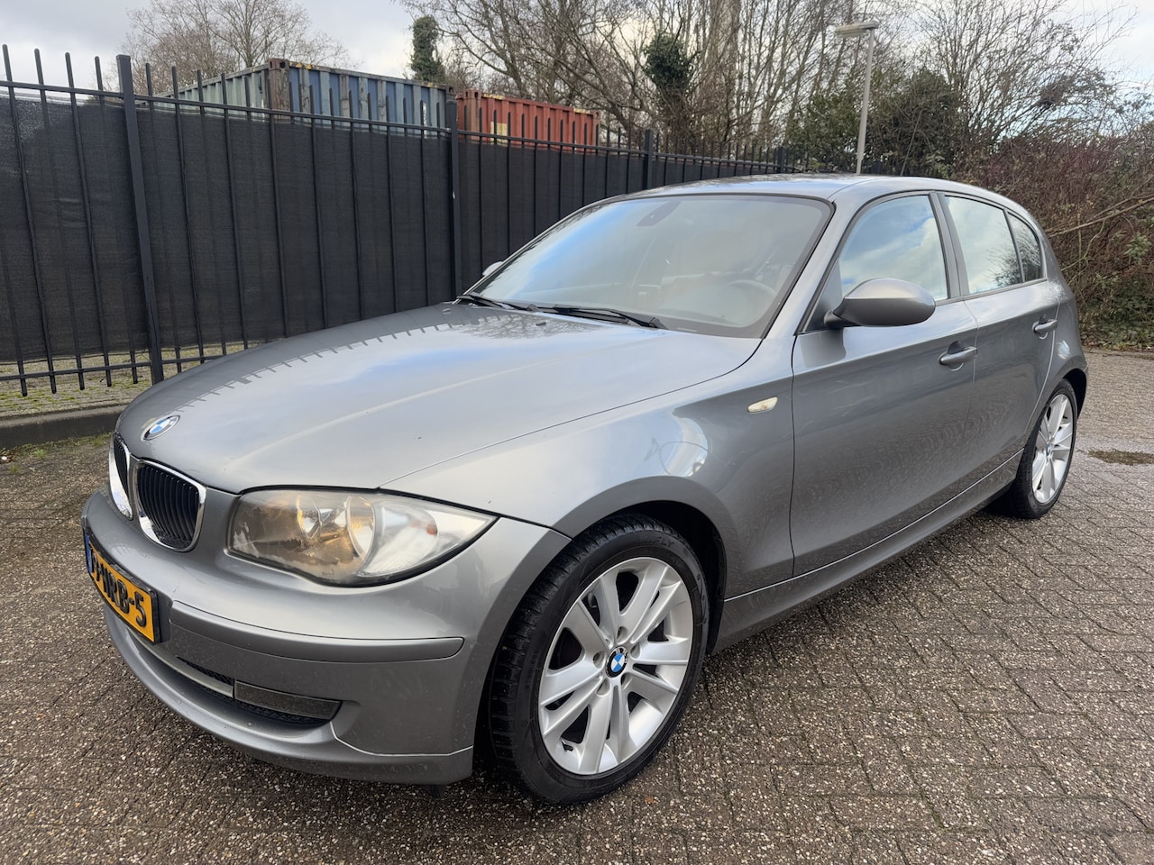 BMW 1-serie - 116i High Executive Sportleer/Clima/LMV - AutoWereld.nl