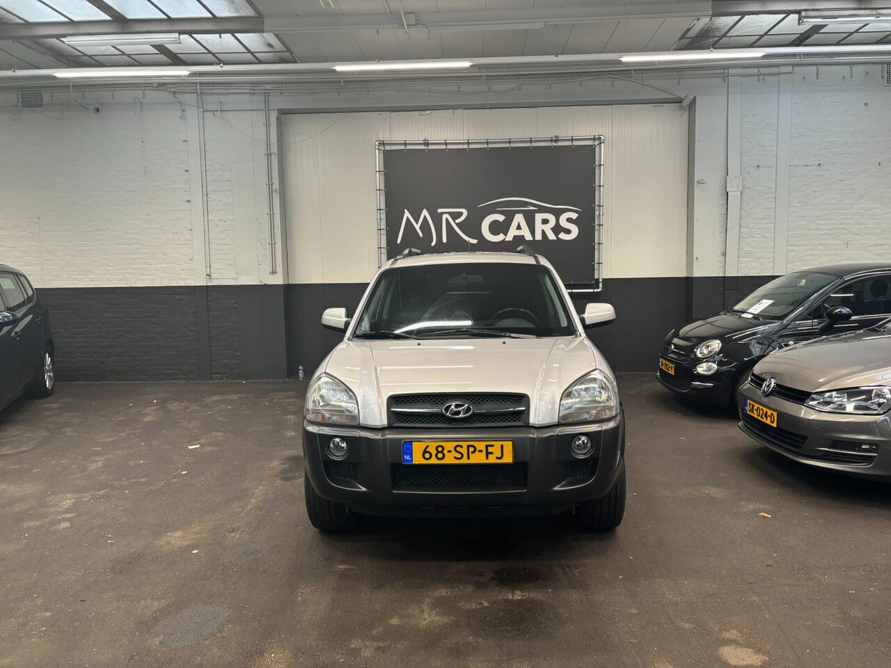 Hyundai Tucson - 2.0i Dynamic airco - AutoWereld.nl