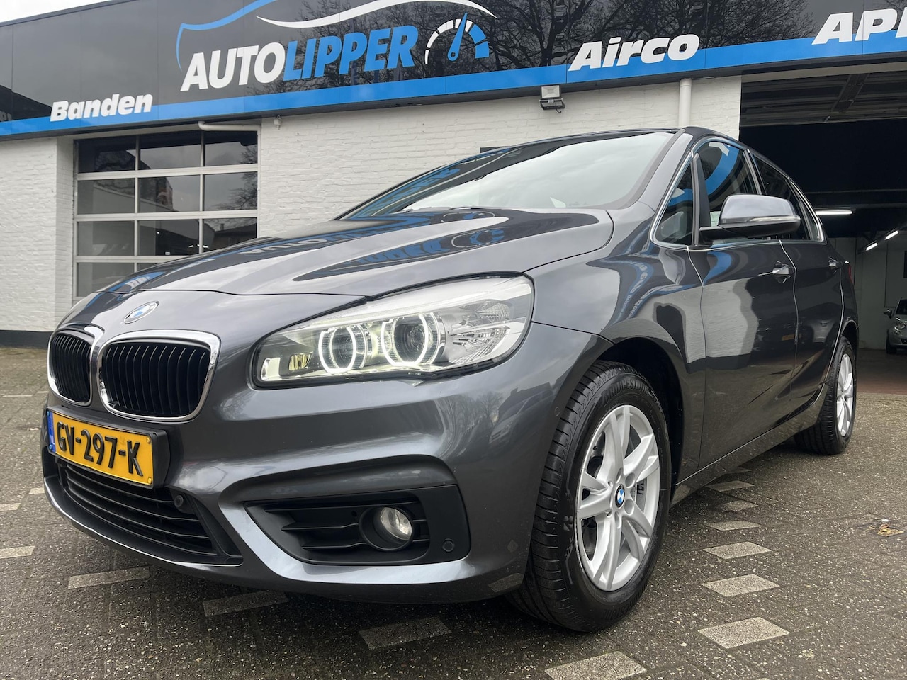 BMW 2-serie Active Tourer - 218i Essential /Trekhaak/Lm velgen/Navigatie - AutoWereld.nl