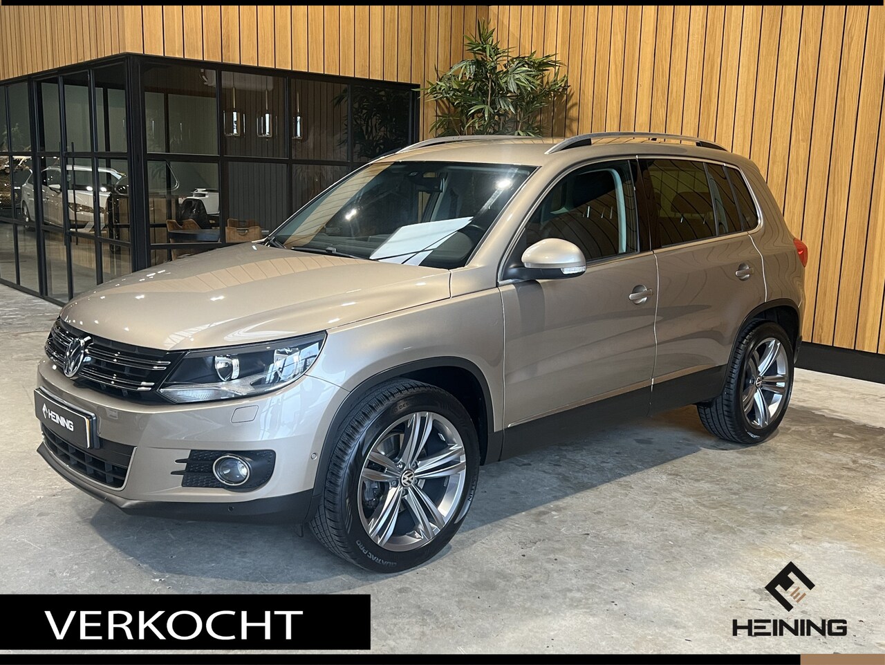 Volkswagen Tiguan - 1.4 TSI Sport&Style Navi, Trekhaak 1800 kg, 19 inch. - AutoWereld.nl