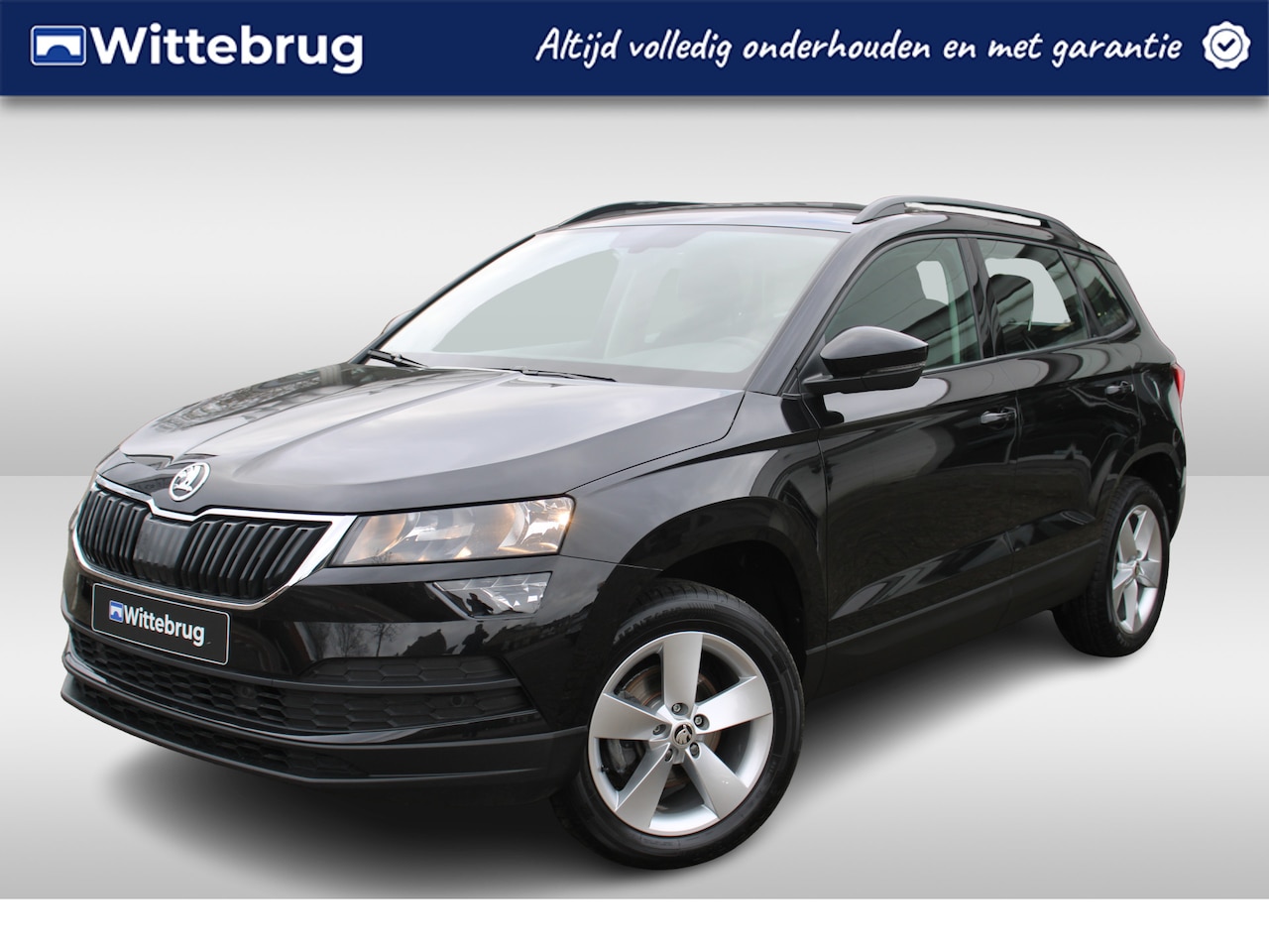 Skoda Karoq - 1.0 TSI 110pk Ambition LM 17 inch / Navigatie by APP / Airco / Keyless / Parkeersensoren - AutoWereld.nl