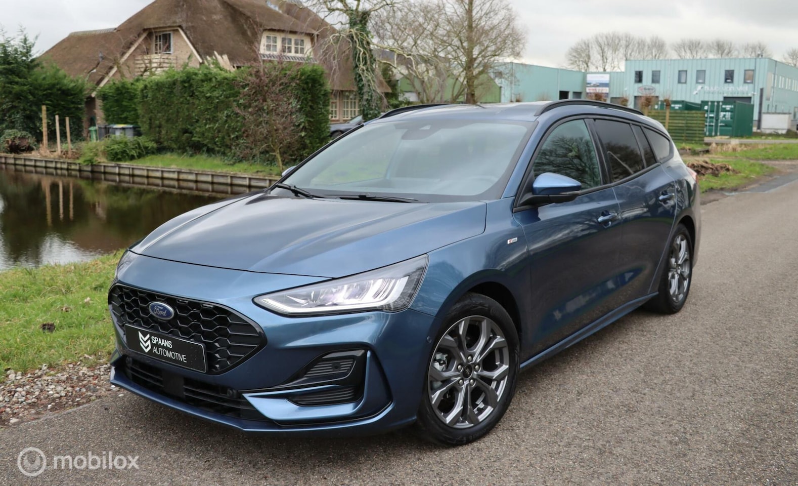 Ford Focus Wagon - 1.0 EcoBoost Hybrid ST Line / Navi / Camera - AutoWereld.nl