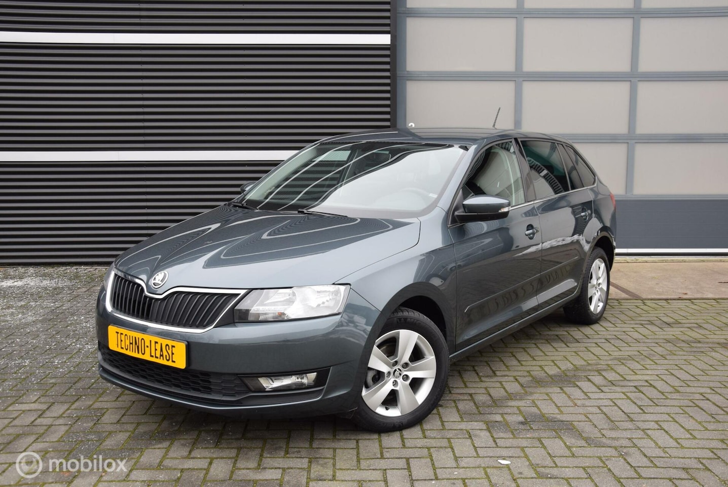 Skoda Rapid Spaceback - 1.0 TSI Business edition Climate control Navi stoelverwarming - AutoWereld.nl