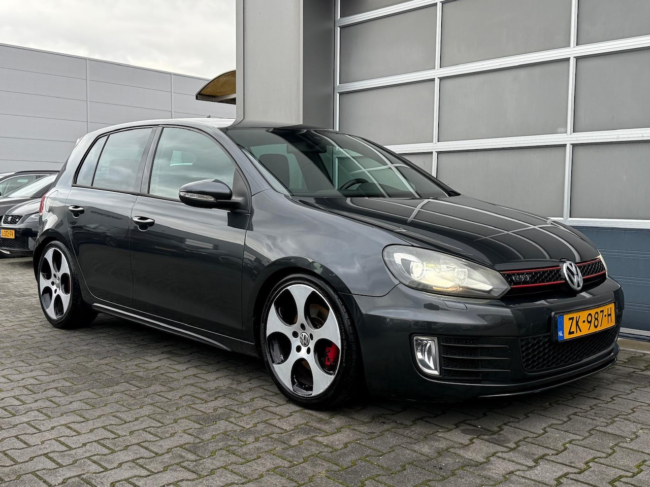 Volkswagen Golf - 2.0 GTI|Xenon|Cruise|PDC|Clima|Akrapovic - AutoWereld.nl