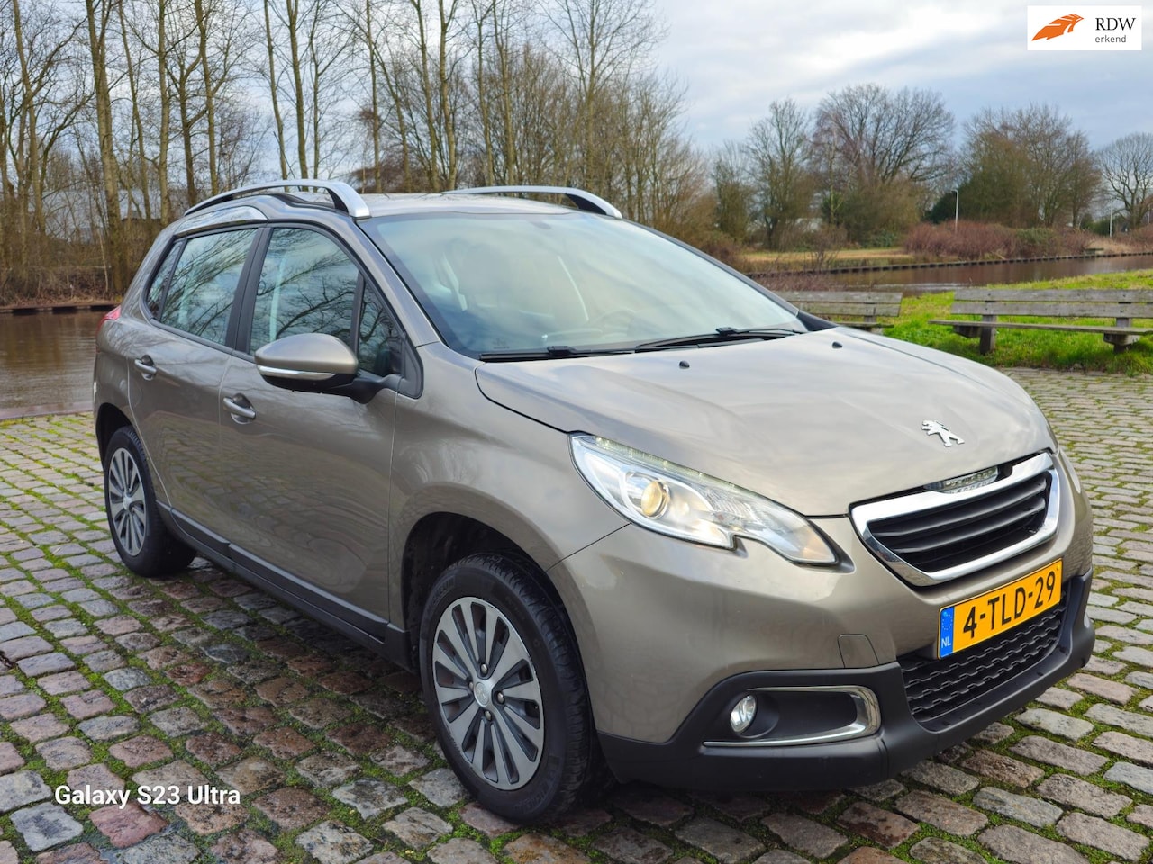 Peugeot 2008 - 1.2 VTi Active Automaat 3e eigenaar dealer onderhouden navigatie cruis control parkeer sen - AutoWereld.nl