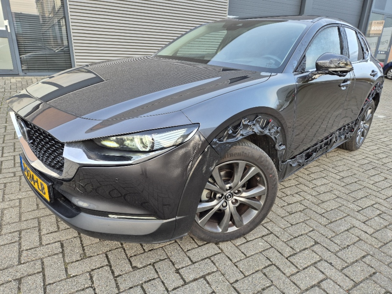 Mazda CX-30 - 2.0 e-SkyActiv-X M Hybrid Luxury 61.000km plastic schroei schade - AutoWereld.nl