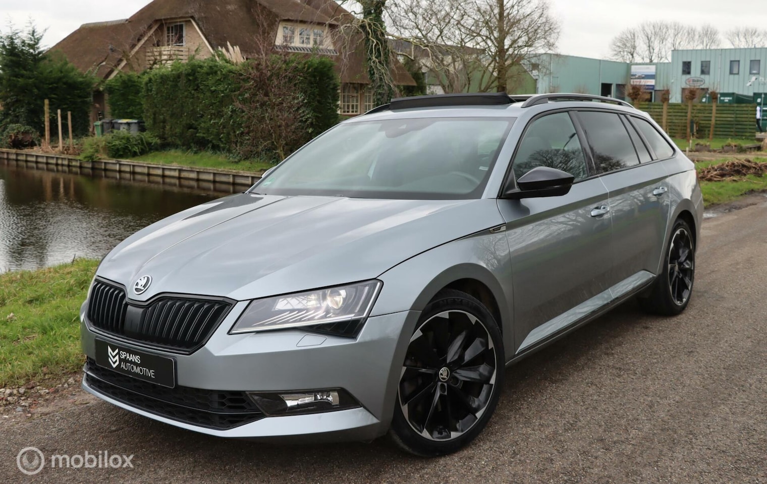 Skoda Superb Combi - 2.0 TSI 4x4 Sportline / Pano / Trekhaak - AutoWereld.nl