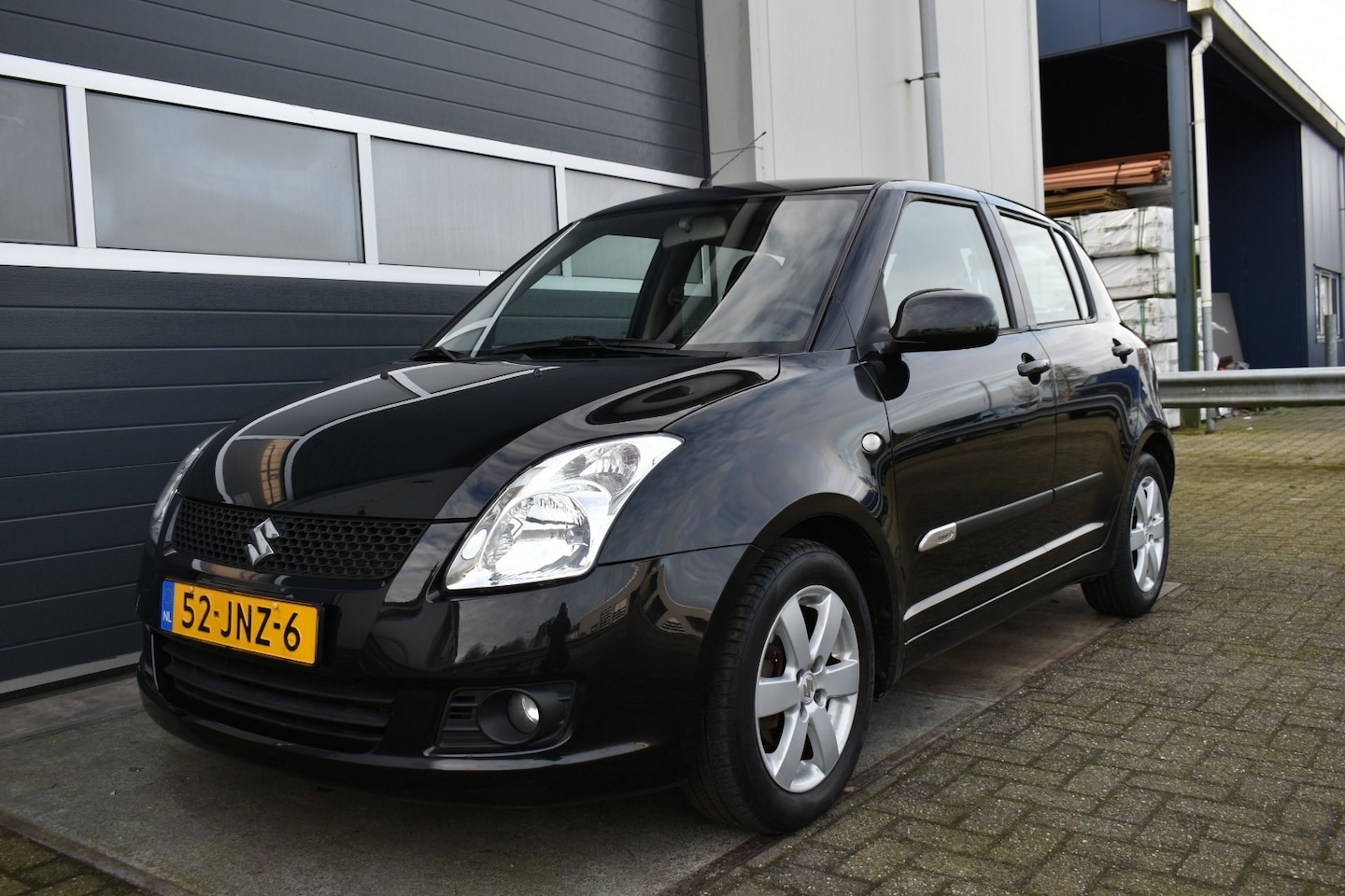 Suzuki Swift - 1.3 Bandit lage km.stand - AutoWereld.nl