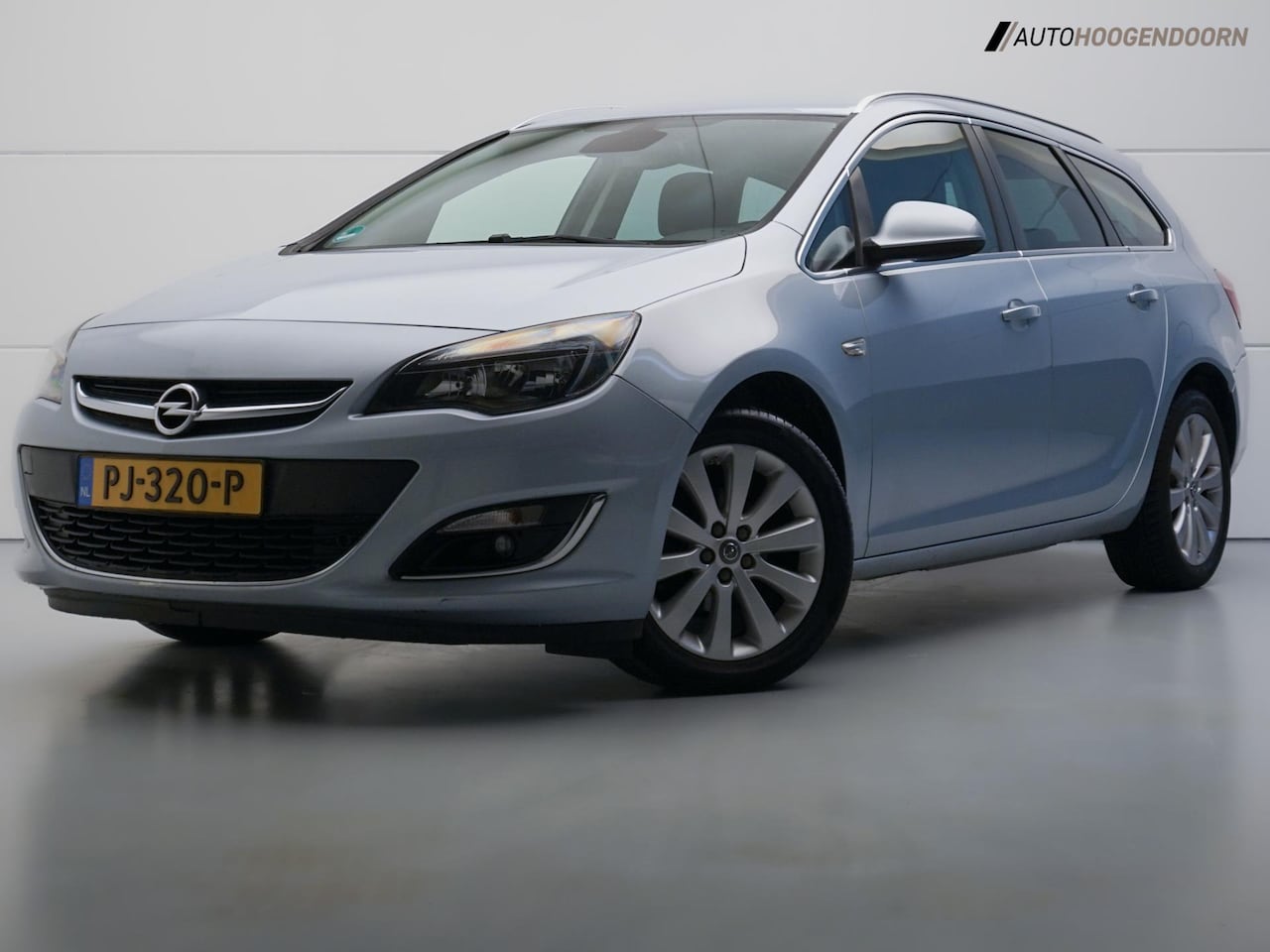 Opel Astra Sports Tourer - 1.4 Edition (NAVIGATIE,LED VERLICHTING,LEDER,CLIMATE,CRUISE,LM-VELGEN,TREKHAAK,TOPCONDITIE - AutoWereld.nl