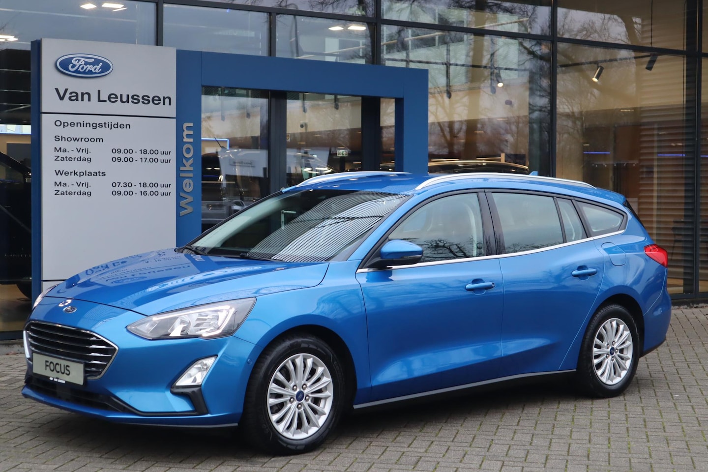 Ford Focus Wagon - 125PK HYBRID TITANIUM APPLE/ANDROID CLIMA NAVI CAMERA WINTERPACK BLIND SPOT KEYLESS PARK-S - AutoWereld.nl