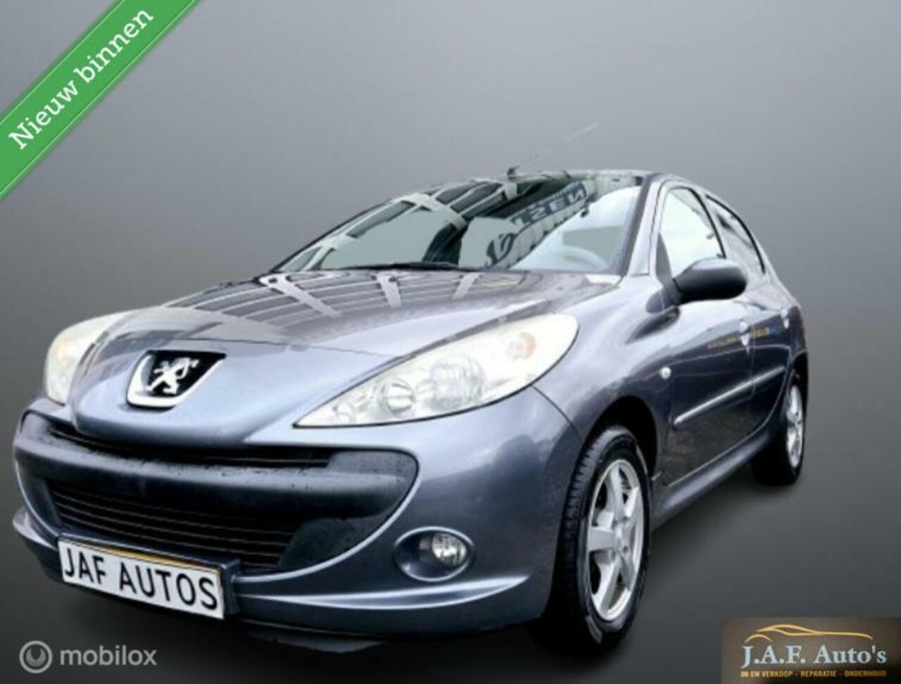 Peugeot 206 - 1.4 Airco Cruise LMV 5drs Nw APK+Distributie! - AutoWereld.nl