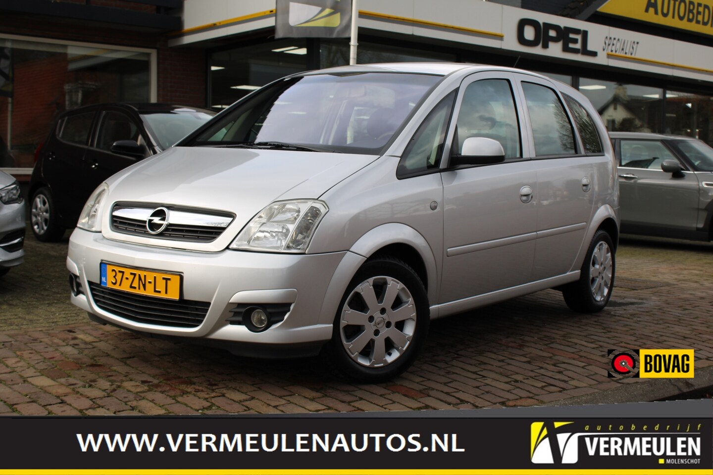 Opel Meriva - 1.6 105PK Temptation + 16''/ Clima/ Cruise/ Trekhaak/ NL auto - AutoWereld.nl