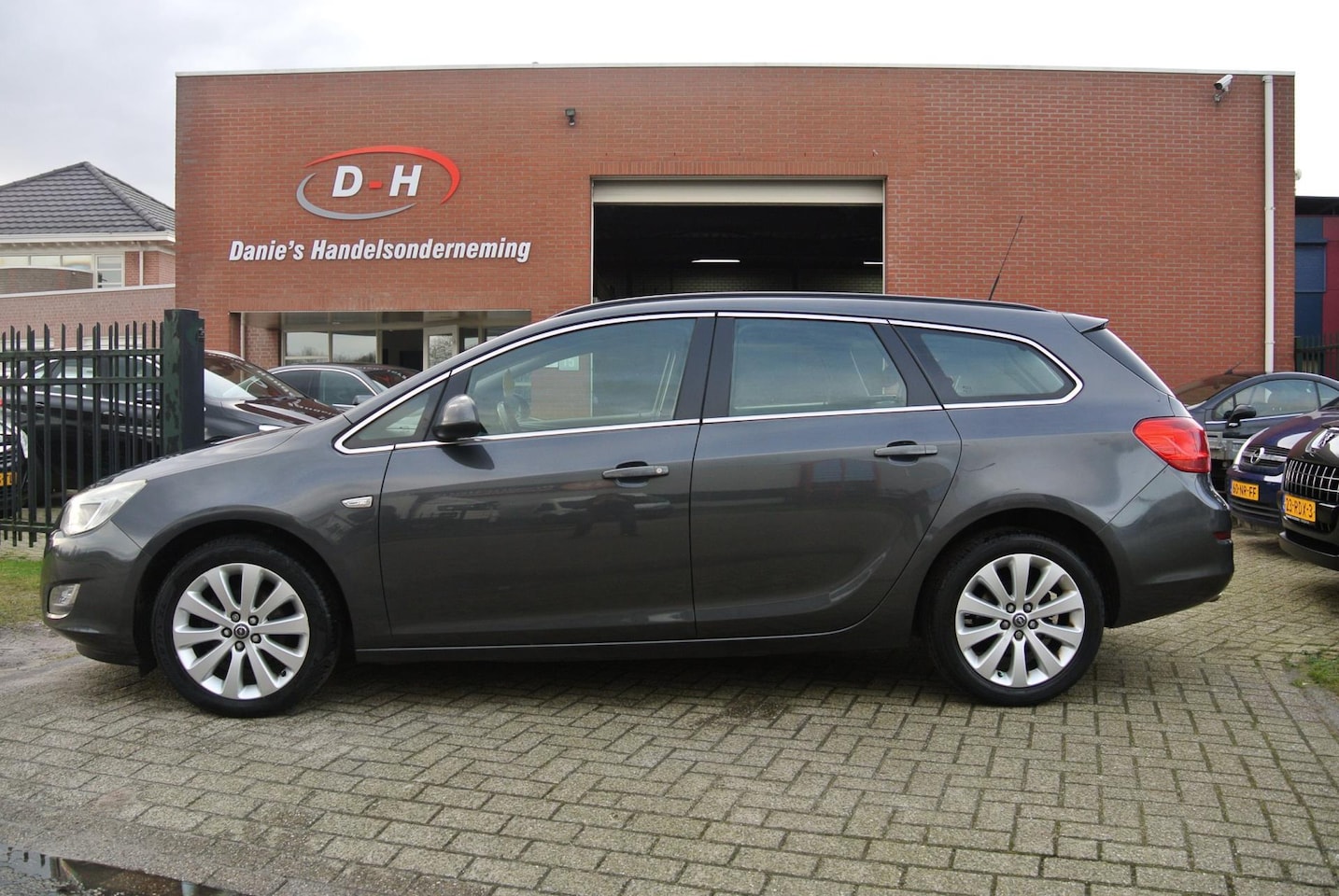 Opel Astra Sports Tourer - 1.4 Turbo Edition airco inruil mogelijk - AutoWereld.nl