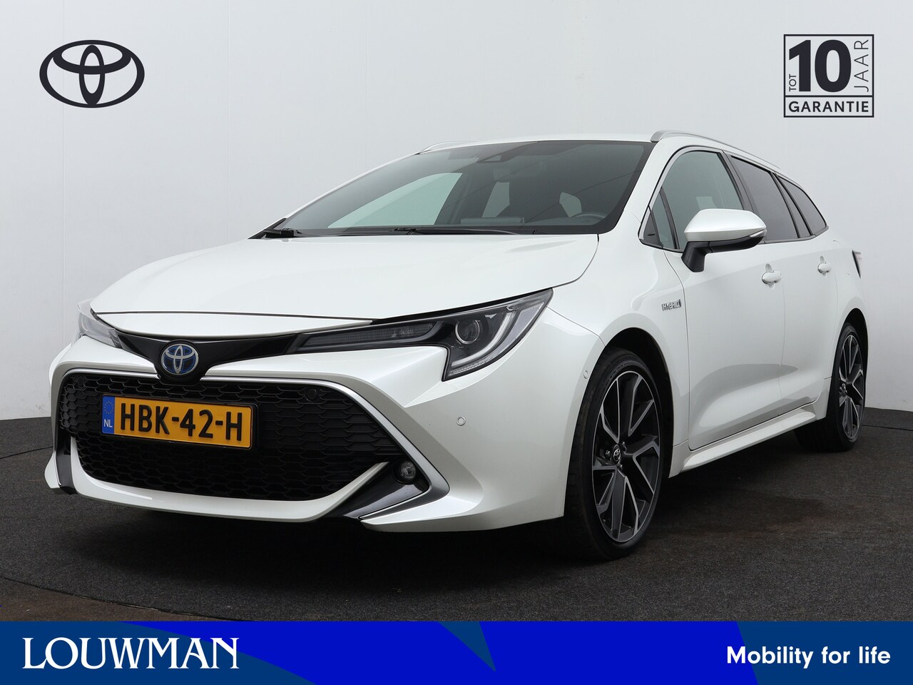 Toyota Corolla Touring Sports - 2.0 Hybrid Executive Limited | Parkeersensoren | Dodehoek Ass. | Stoelverwarming | LM velg - AutoWereld.nl