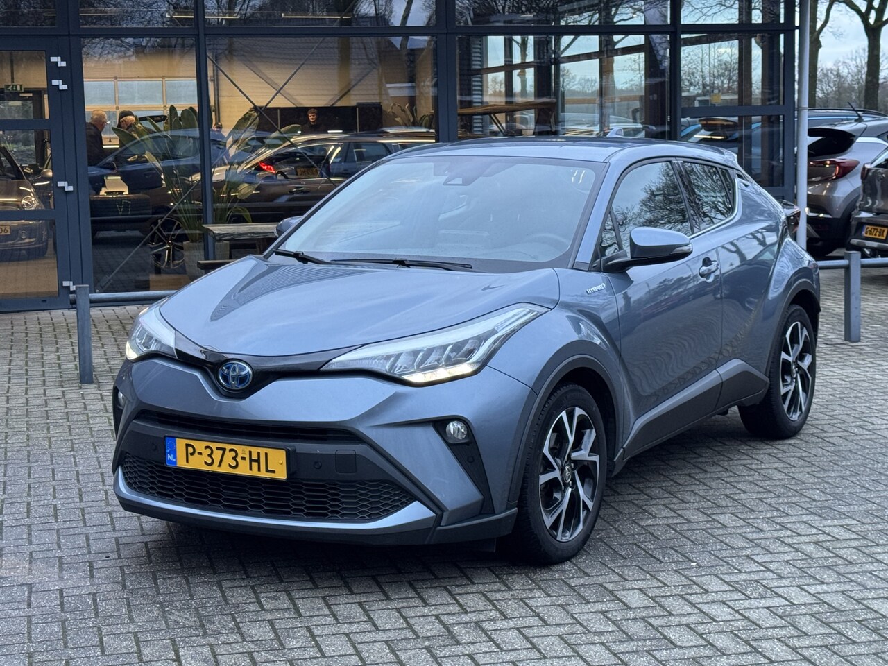 Toyota C-HR - 1.8 Hybrid Dynamic Trekhaak/Camera/Climate control/Cruise/PDC/LED - AutoWereld.nl