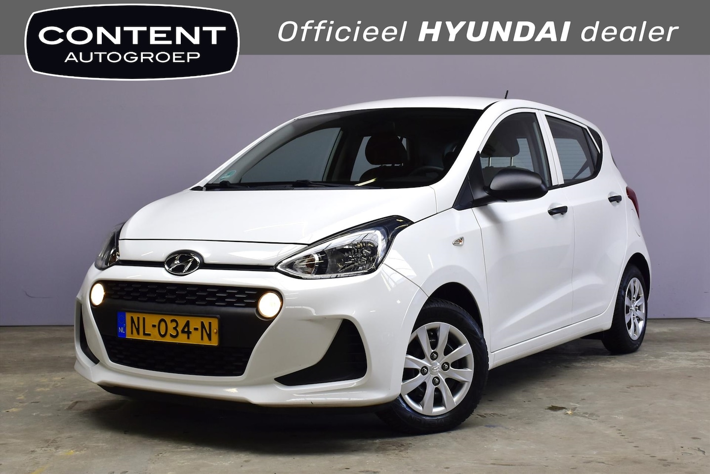 Hyundai i10 - 1.0i i-Motion I Airco I lage km-stand. - AutoWereld.nl