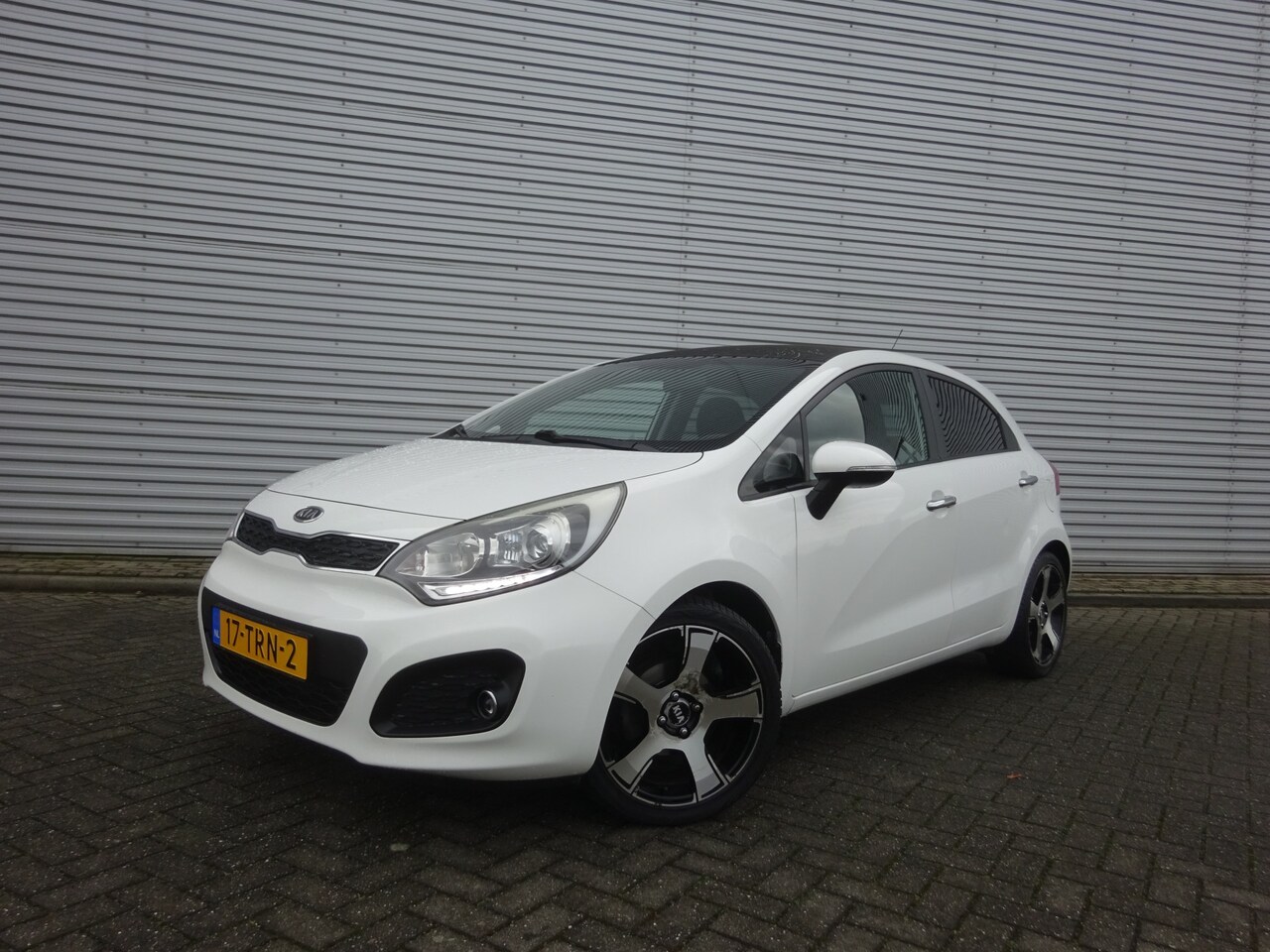 Kia Rio - 1.2 CVVT Super Pack Airco / Elektr. ramen / Parkeers. / Cruise / NAP - AutoWereld.nl