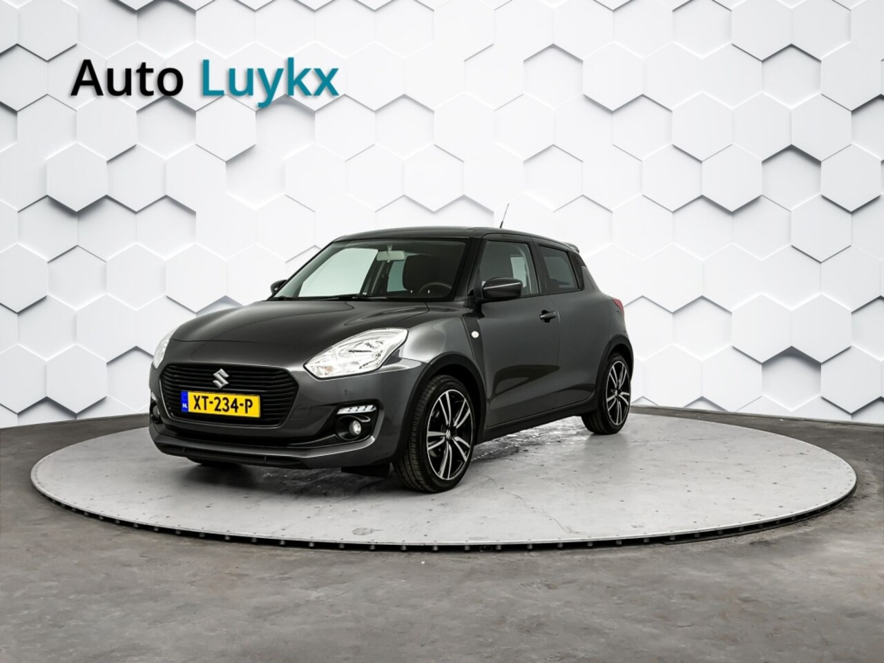 Suzuki Swift - 1.2 Sportline | Navigatie | 17'' L.M. Velgen | Dakspoiler - AutoWereld.nl