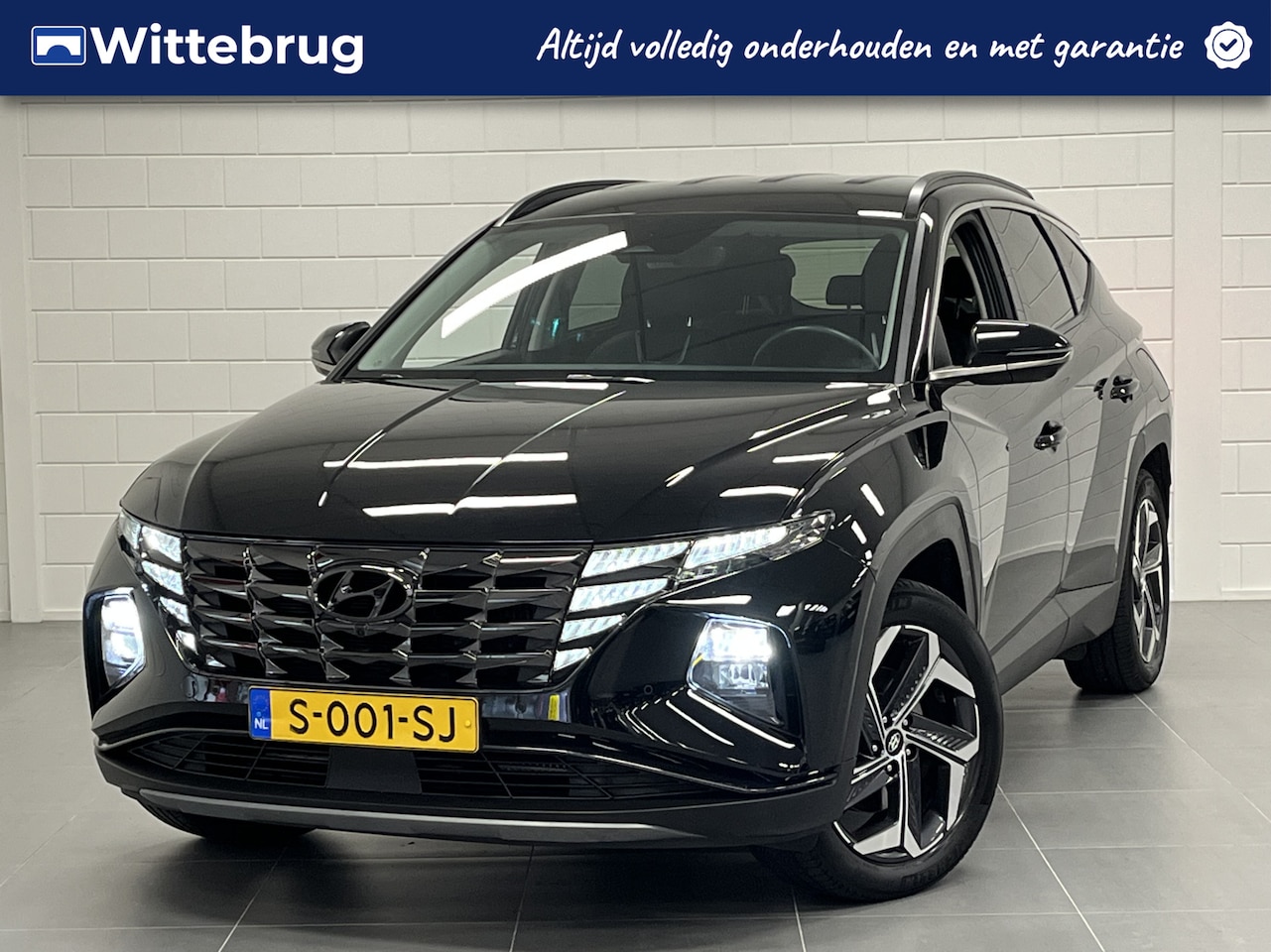 Hyundai Tucson - 1.6 T-GDI PHEV Premium 4WD LEDER | NAVIGATIE | 19 INCH VELGEN | ZEER COMPLETE AUTO - AutoWereld.nl