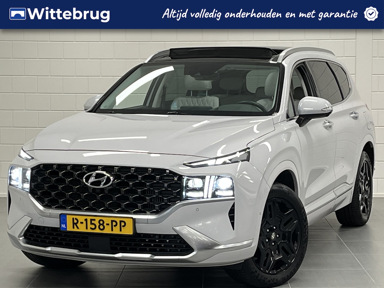 Hyundai Santa Fe - 1.6 T-GDI PHEV Premium Plus Sky TREKHAAK | PANORAMADAK | LEDER | FULL OPTIONS! - AutoWereld.nl