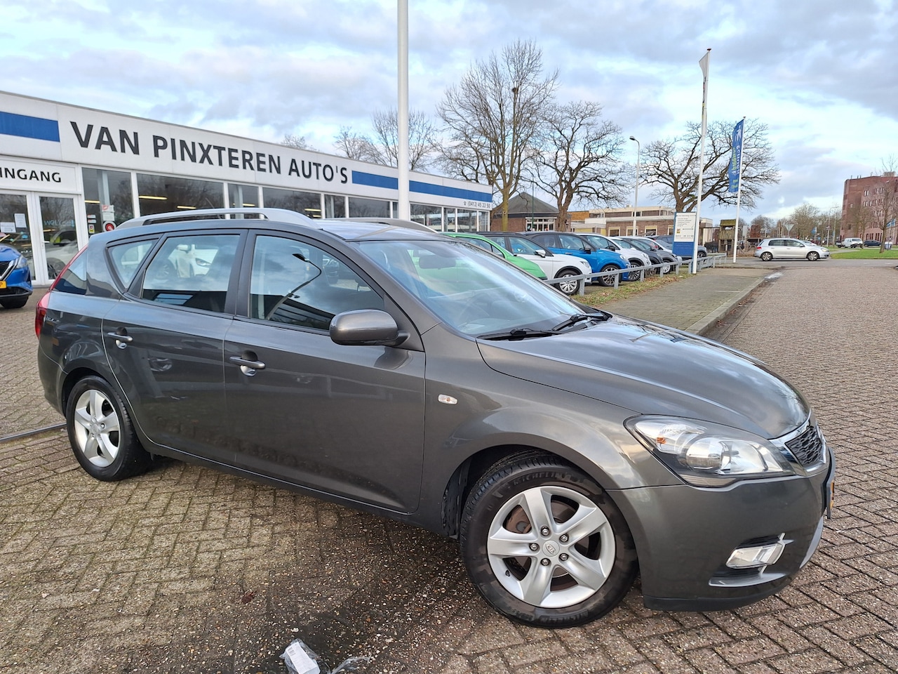 Kia Cee'd Sporty Wagon - 1.4 CVVT Navigator Plus Pack TREKHAAK - AutoWereld.nl