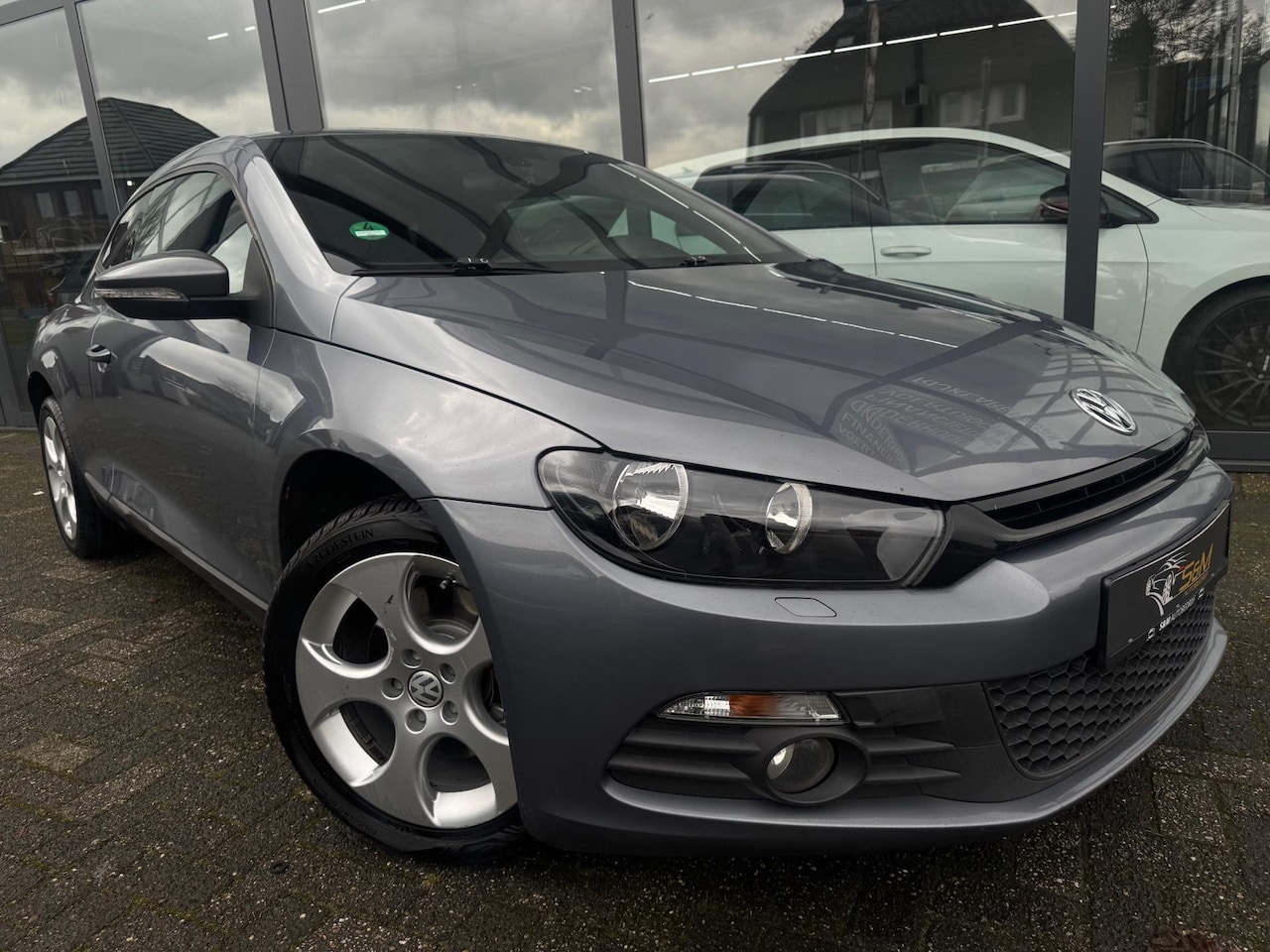 Volkswagen Scirocco - 1.4 TSI Highline CarPlay - AutoWereld.nl