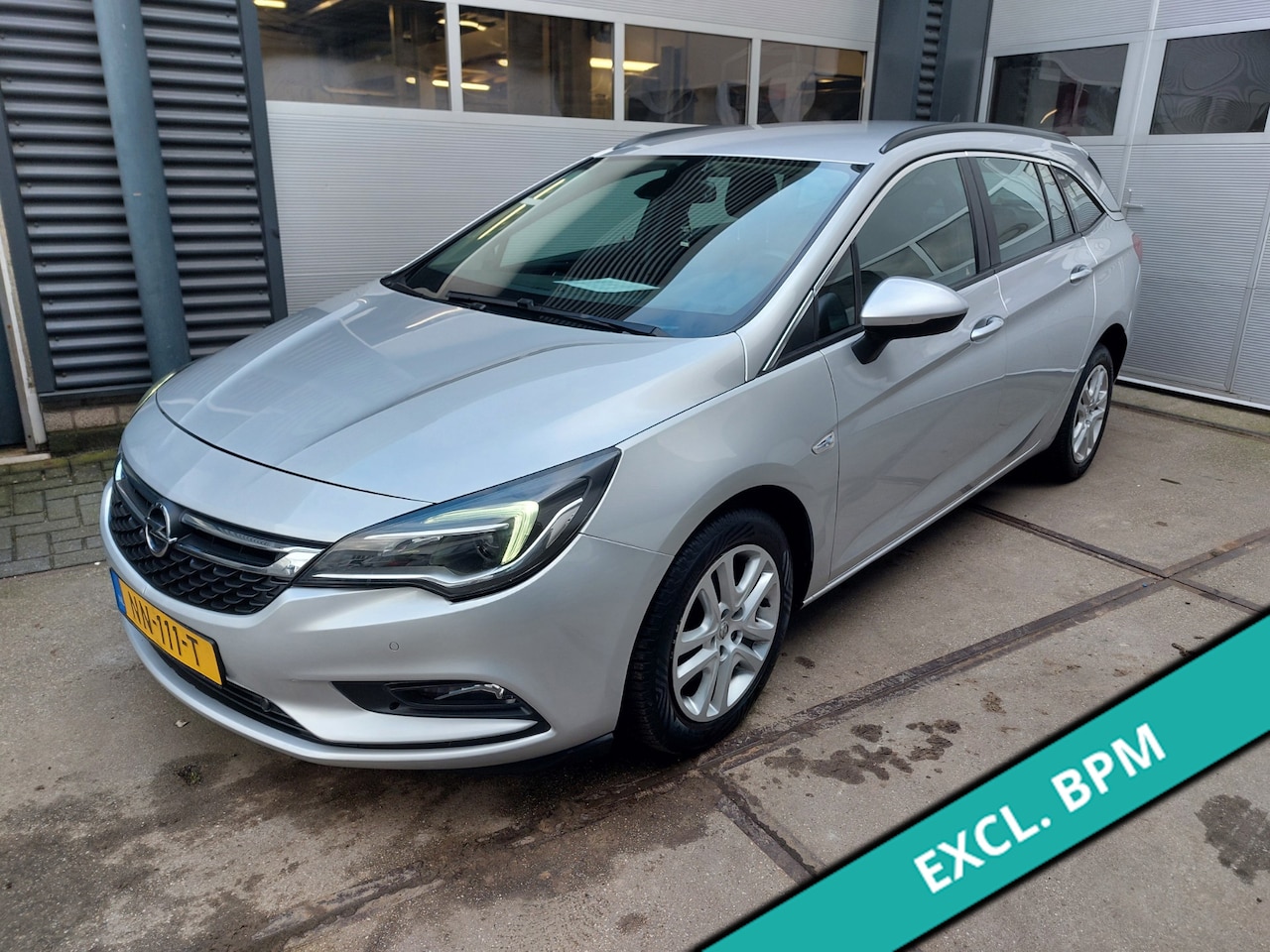 Opel Astra Sports Tourer - 1.6 CDTI Edition Airco/ECC/NAV - AutoWereld.nl