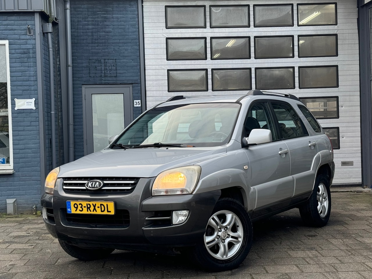 Kia Sportage - 2.0 CVVT Executive | Clima | Cruise | N.A.P - AutoWereld.nl