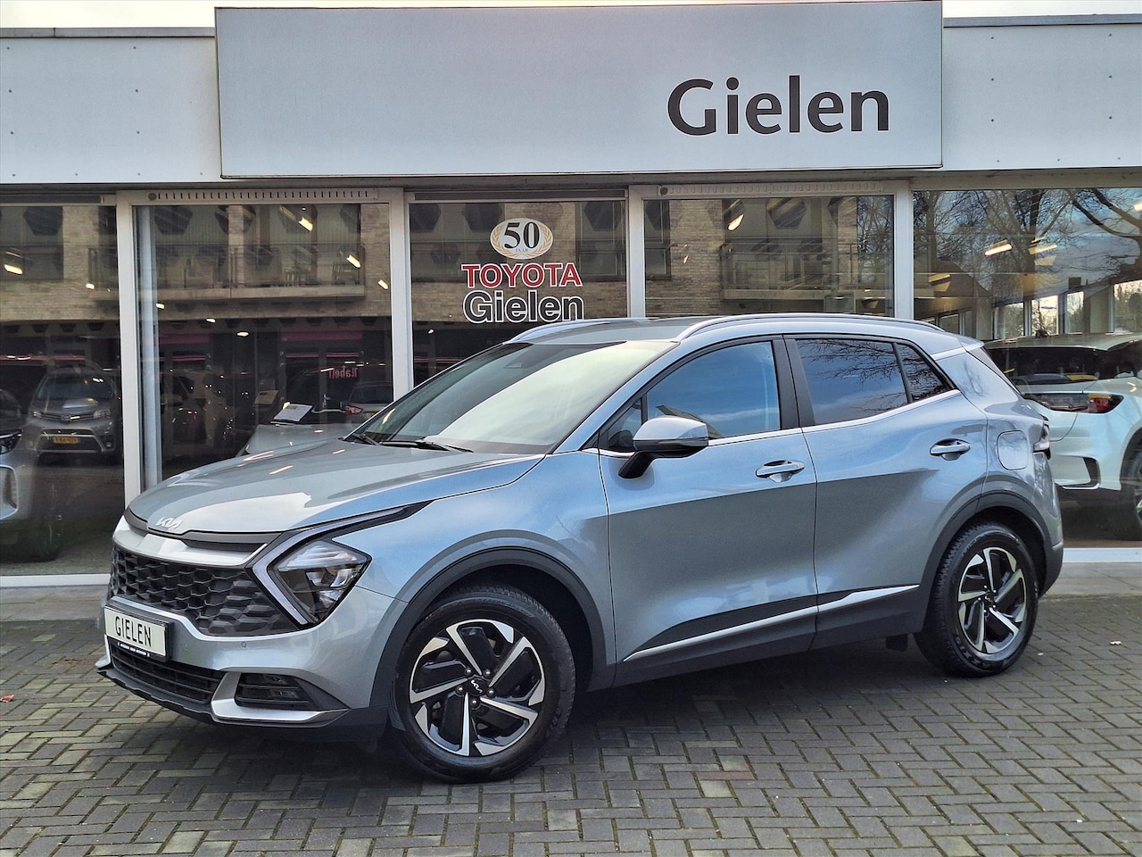 Kia Sportage - 1.6 T-GDi Mild Hybrid Dynamicline | Stoel + Stuurverwarming, Navigatie, CarPlay, Parkeerse - AutoWereld.nl