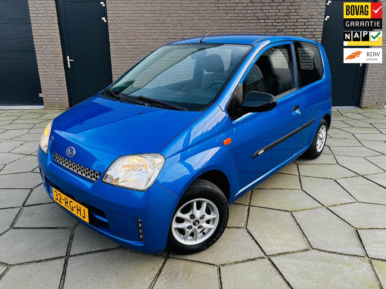 Daihatsu Cuore - 1.0-12V Osaka | 3 Drs |Metallic |Lm VLG| Fris en netjes - AutoWereld.nl