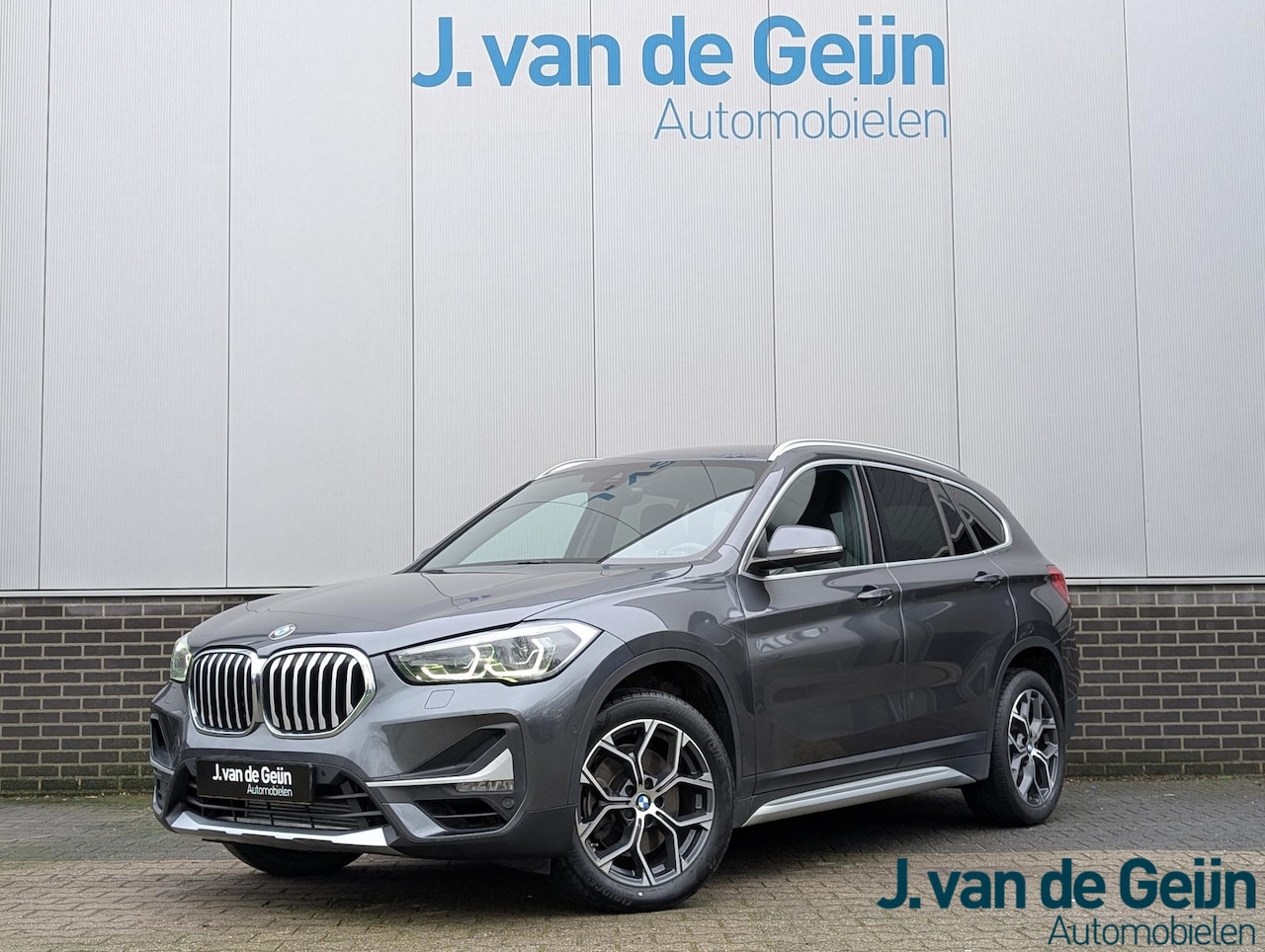 BMW X1 - sDrive20i High Executive | 1/2 Leer | Sportstoel | LED | Comfort access | Dealeroh | 1 Eig - AutoWereld.nl