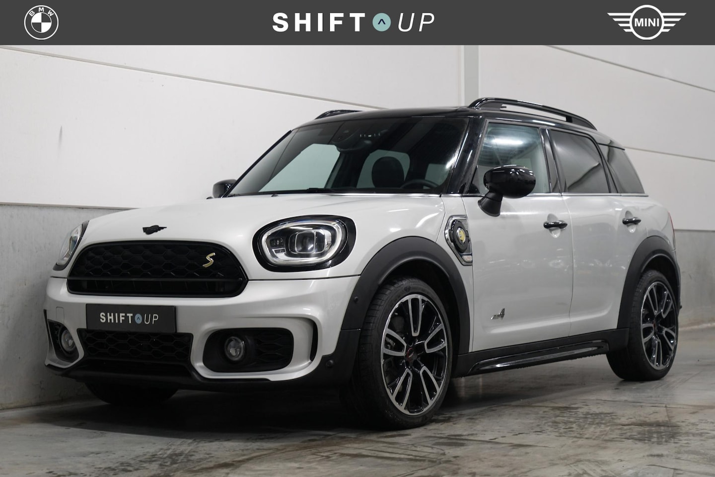 MINI Countryman - Mini 2.0 Cooper S E ALL4 JCW | Panoramadak | Head Up | Adapt. Cruise Control - AutoWereld.nl