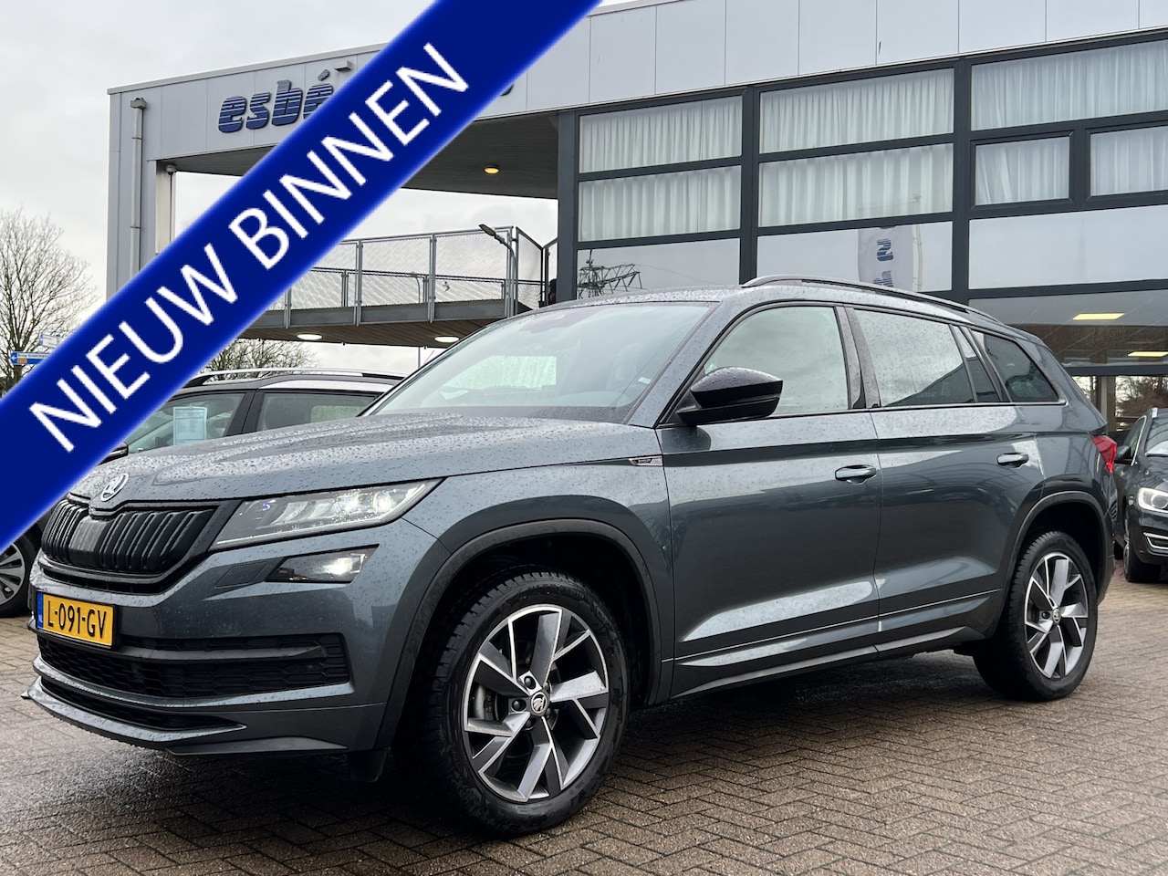 Skoda Kodiaq - 1.5 TSI Automaat Sportline Business Navigatie Trekhaak Elek. Sportstoelen + Verwarming ACC - AutoWereld.nl