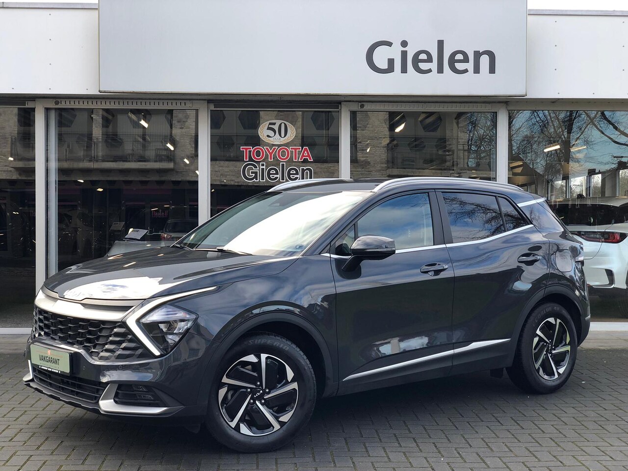 Kia Sportage - 1.6 T-GDi MHEV Dynamicline | Trekhaak, Stoel + Stuurverwarming, Navigatie, CarPlay, Parkee - AutoWereld.nl