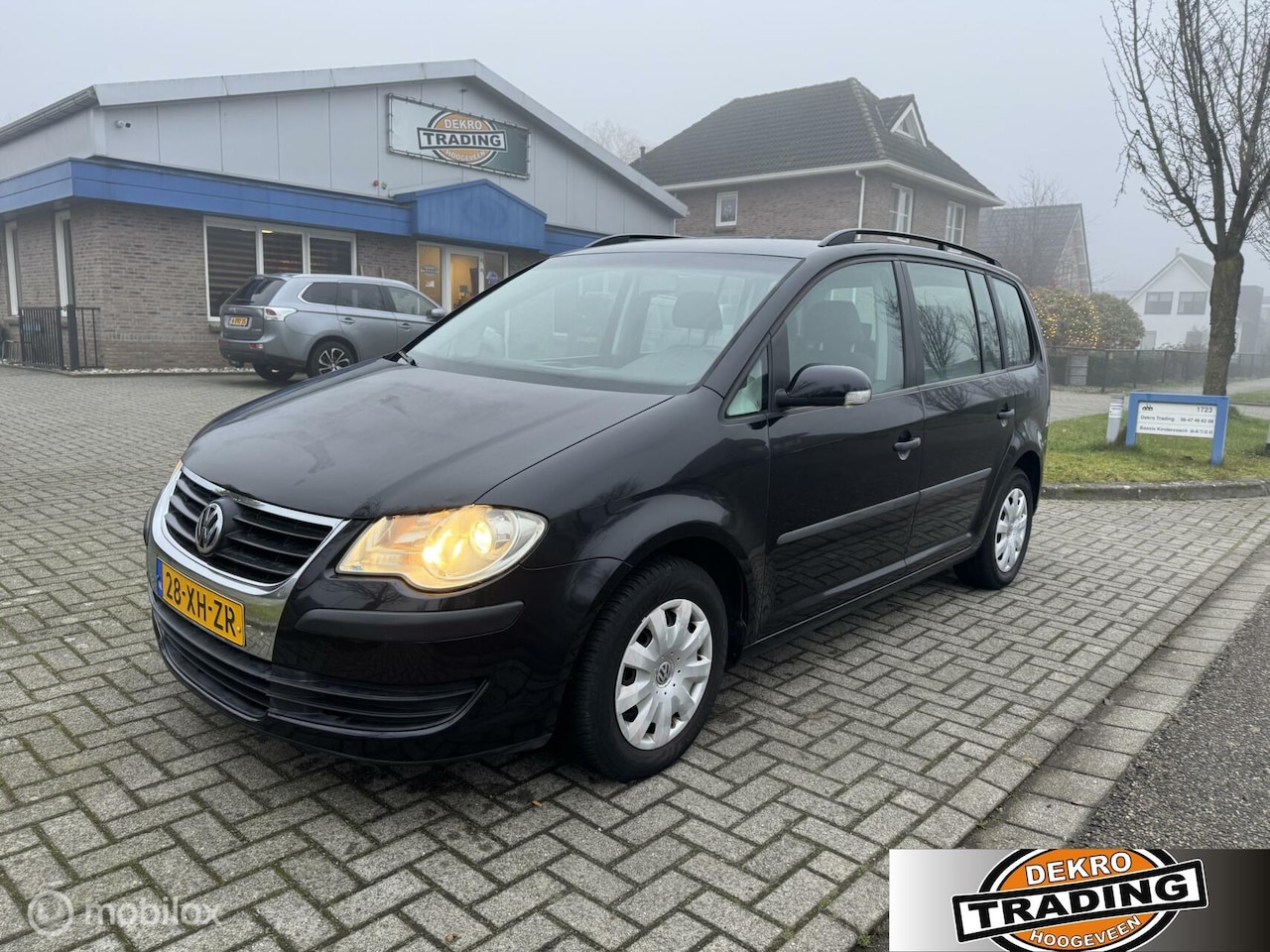 Volkswagen Touran - 1.6 16vComfortline airco cruise Grootscherm - AutoWereld.nl