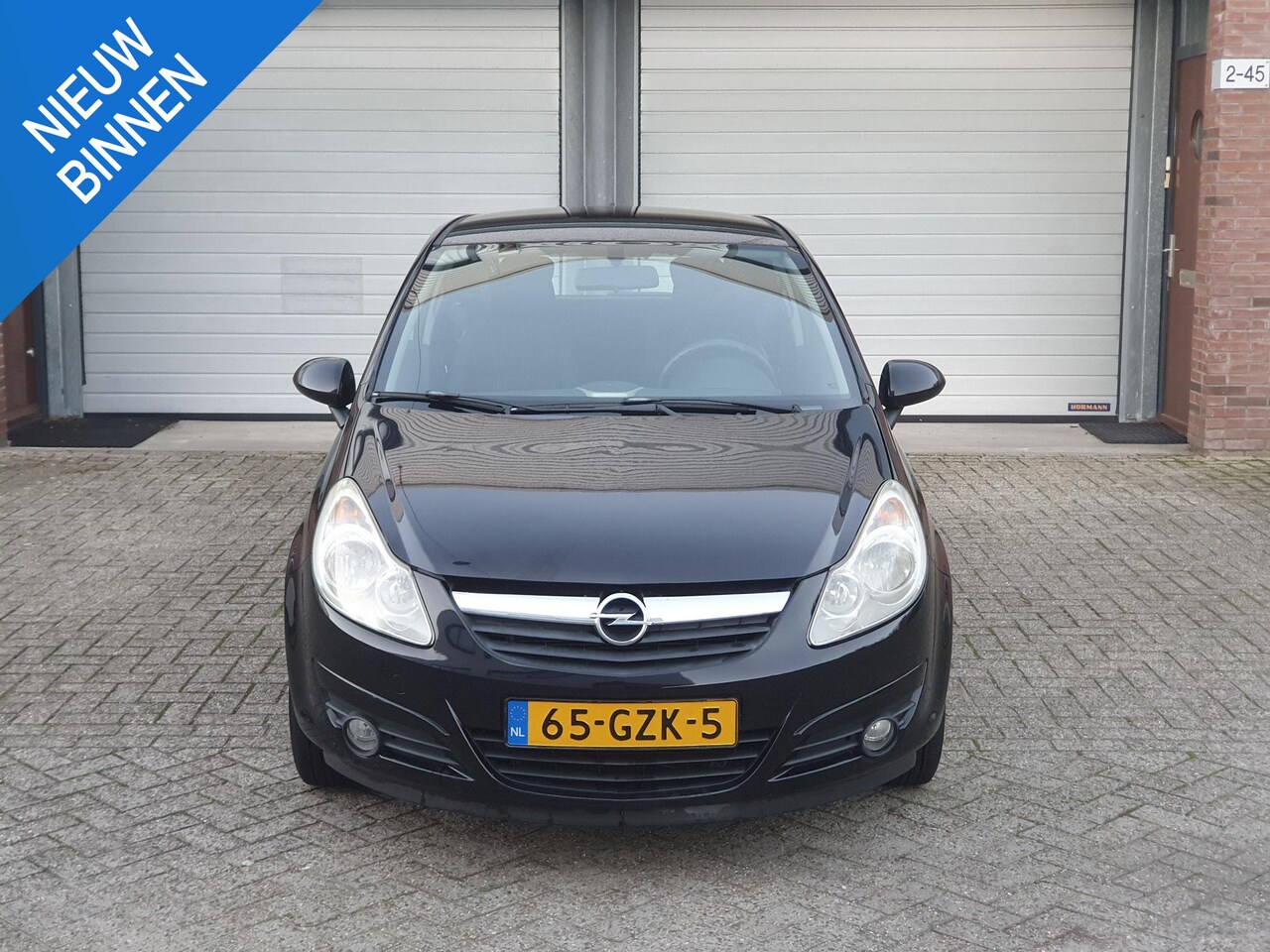 Opel Corsa - 1.4-16V Enjoy 1.4-16V Enjoy - AutoWereld.nl