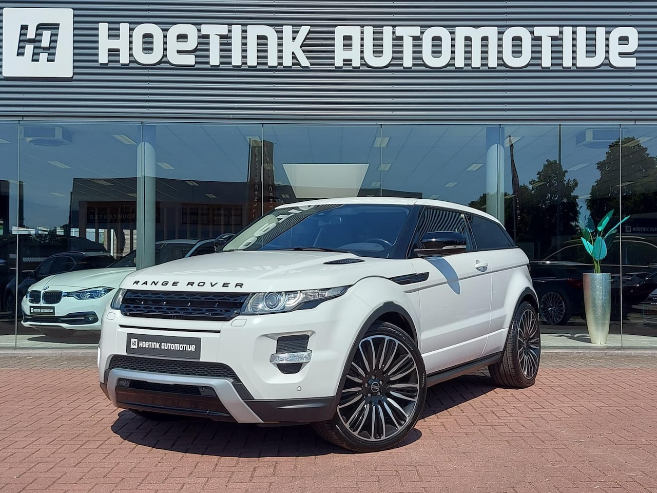 Land Rover Range Rover Evoque Coupé - 2.0 Si 4WD Dynamic | Leer | Cold Climate Pack | 22'' - AutoWereld.nl