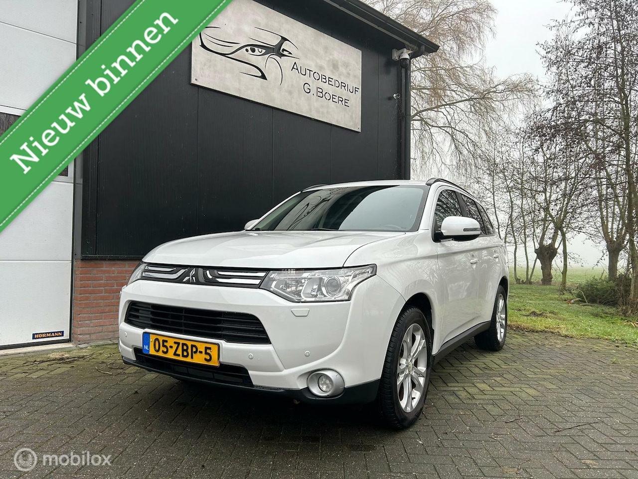 Mitsubishi Outlander - 2.0 Intense 2.0 Intense+, 7 pers, nette auto - AutoWereld.nl