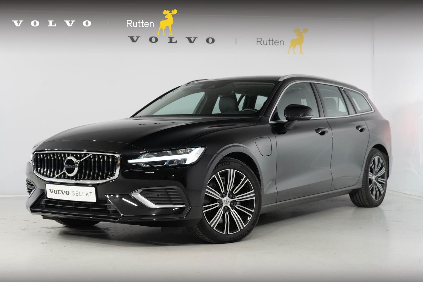 Volvo V60 - T6 350PK Automaat Recharge AWD Inscription Semi-elektrisch inklapbare trekhaak / Lederen b - AutoWereld.nl