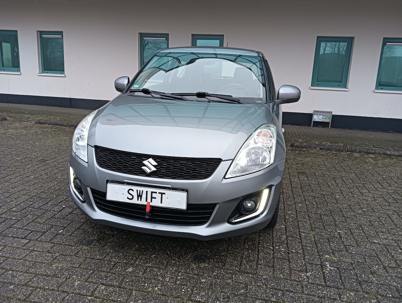 Suzuki Swift - 1.2 Comfort EASSS AIRCO. Cruise control . Topstaat - AutoWereld.nl